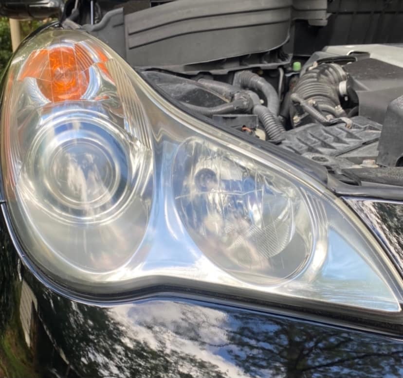 A headlight lens before being restored